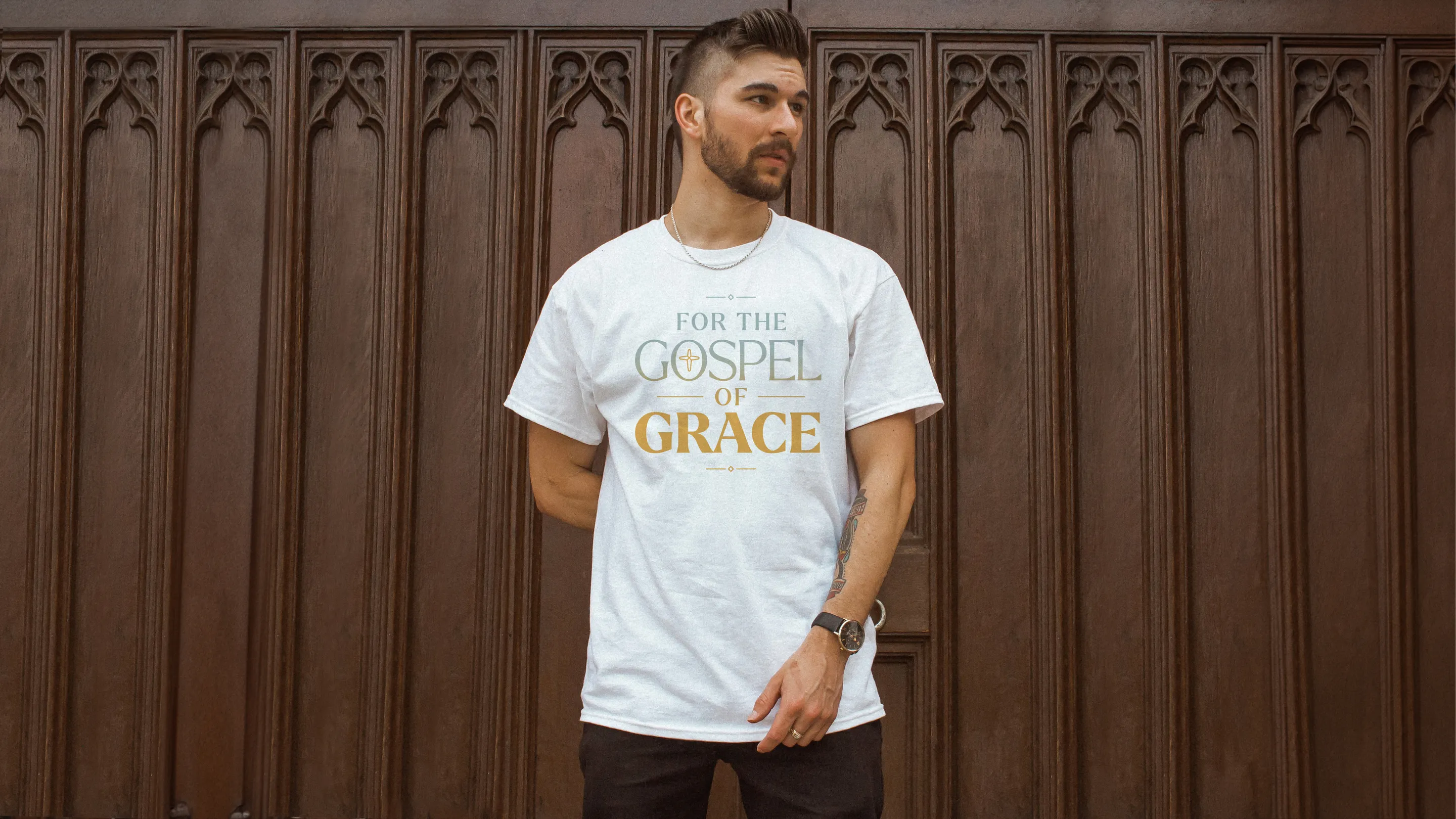 A t-shirt featuring the stylized tagline 'For the Gospel of Grace'
